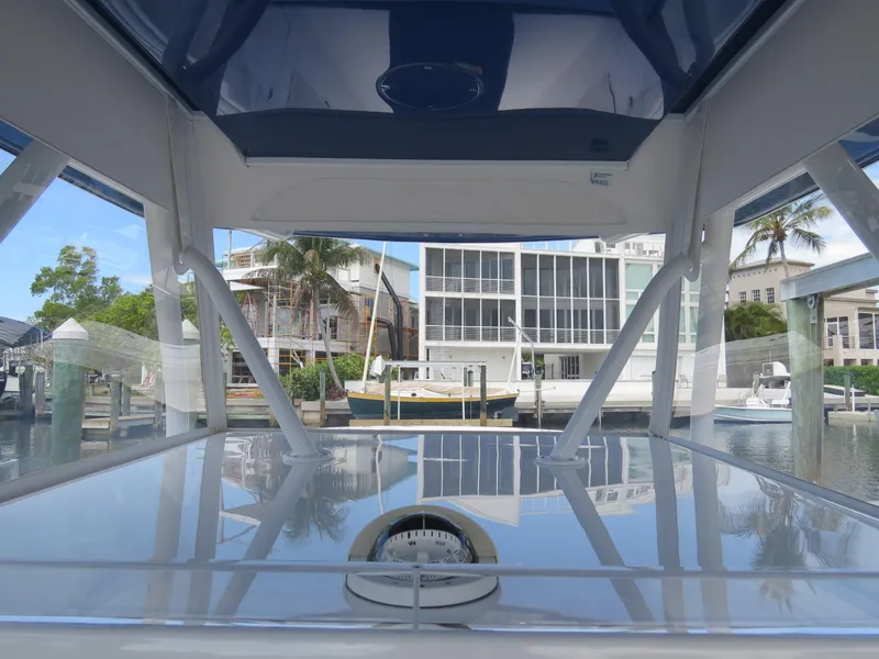 Slide: The Image of Invincible 42 Open Fisherman 2015 boat interior view at marina. - 11
