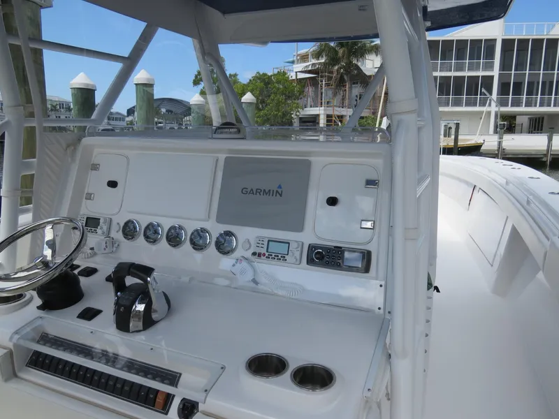 Slide: The Image of 2015 Invincible 42 Open Fisherman boat console with Garmin navigation system. - 7