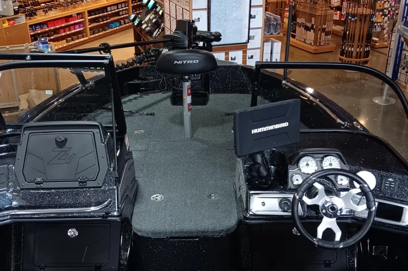 Slide: The Image of 2025 Nitro ZV20 boat interior with steering wheel and navigation system. - 4