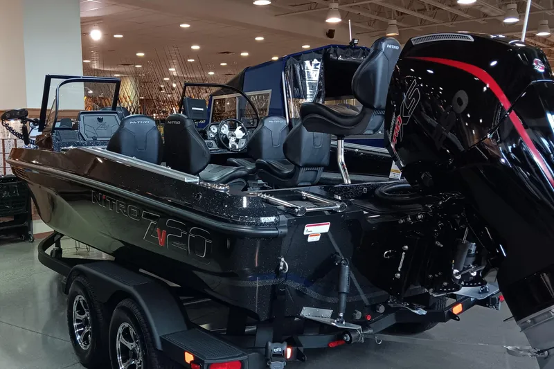 Slide: The Image of 2025 Nitro ZV20 boat with powerful engine on display in showroom. - 6