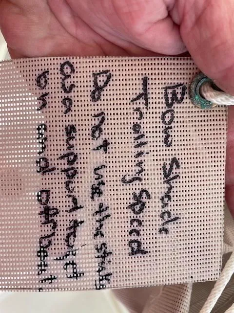 Slide: The Image of Handwritten note on mesh fabric about bow shield trolling speed. - 24