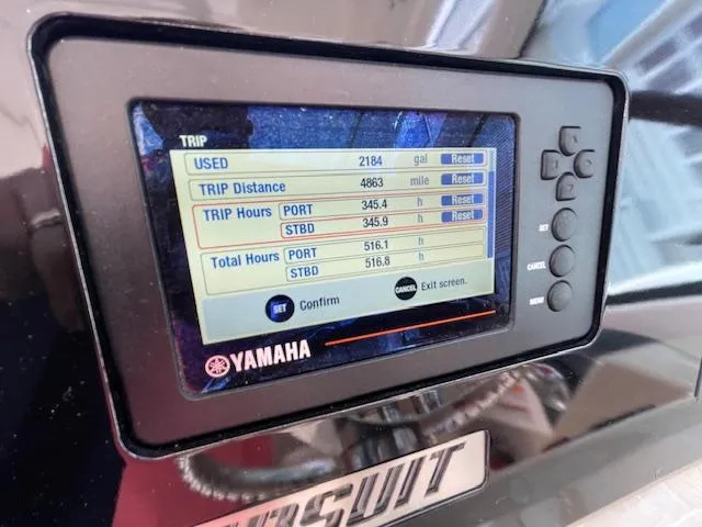 Slide: The Image of Yamaha display on 2018 Pursuit 265 DC showing trip data and engine hours. - 35