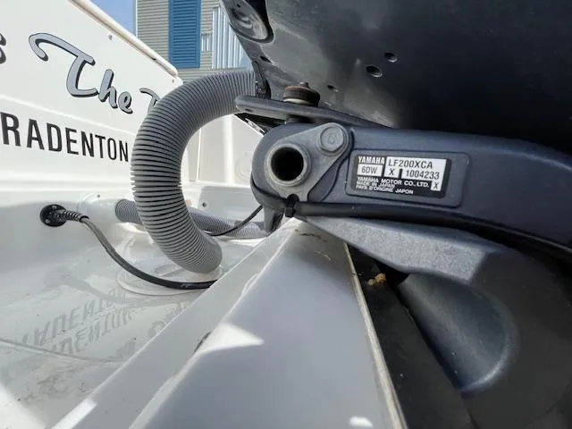 Slide: The Image of 2018 Pursuit 265 DC boat with Yamaha LF200XCA engine detail. - 9