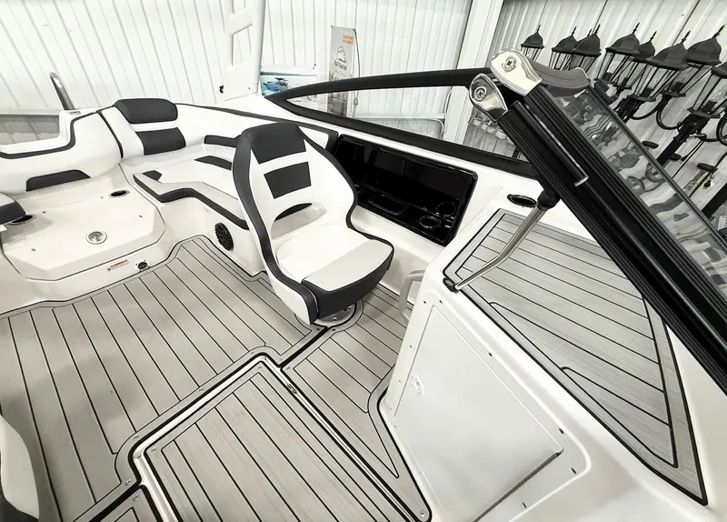 Slide: The Image of 2025 Yamaha Boats 195S interior with sleek seating and modern dashboard design. - 4