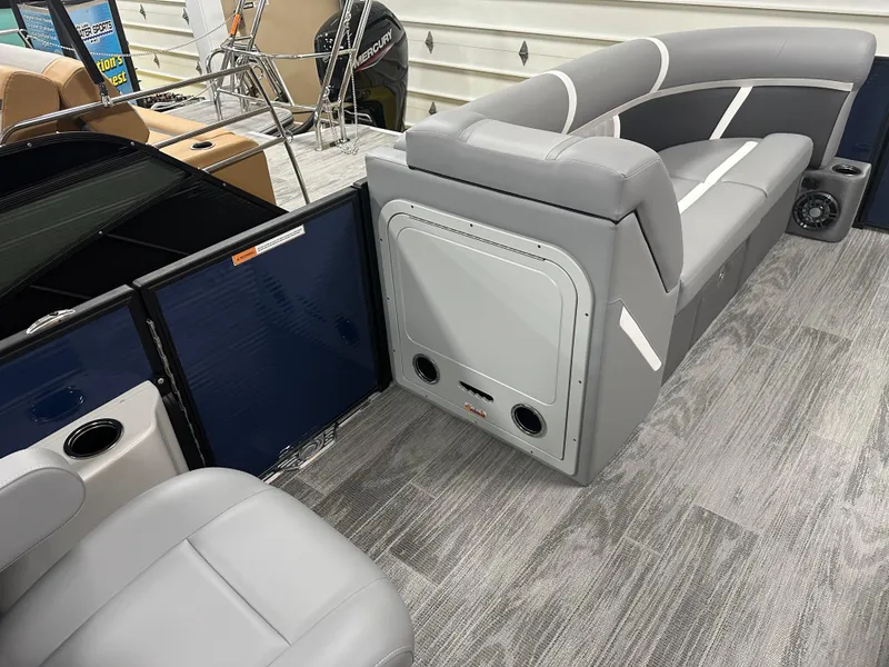 Slide: The Image of 2025 Crest Classic 220 boat interior with gray seating and modern design. - 8