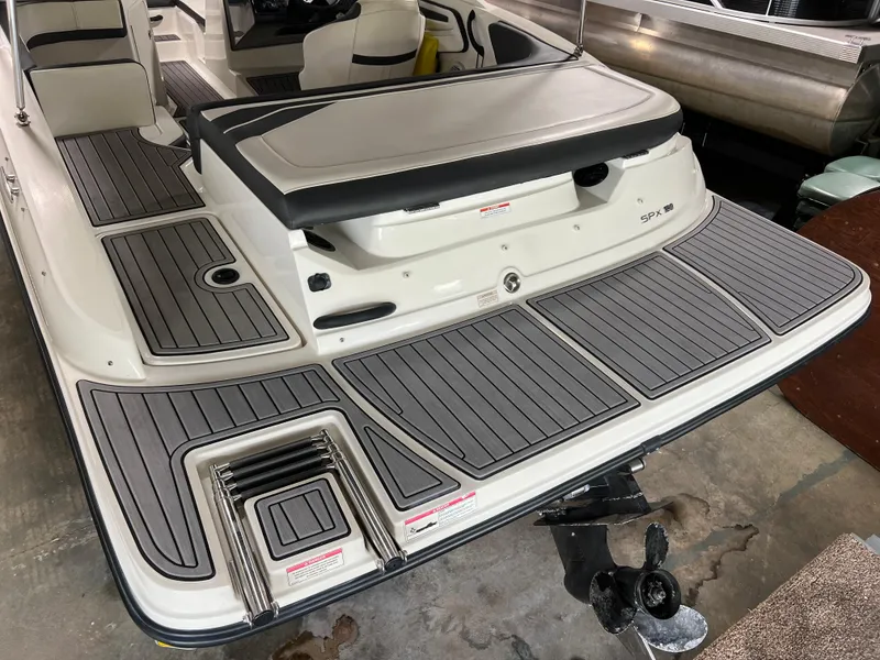 Slide: The Image of 2017 Sea Ray SPX 190 boat with spacious deck and swim platform. - 3