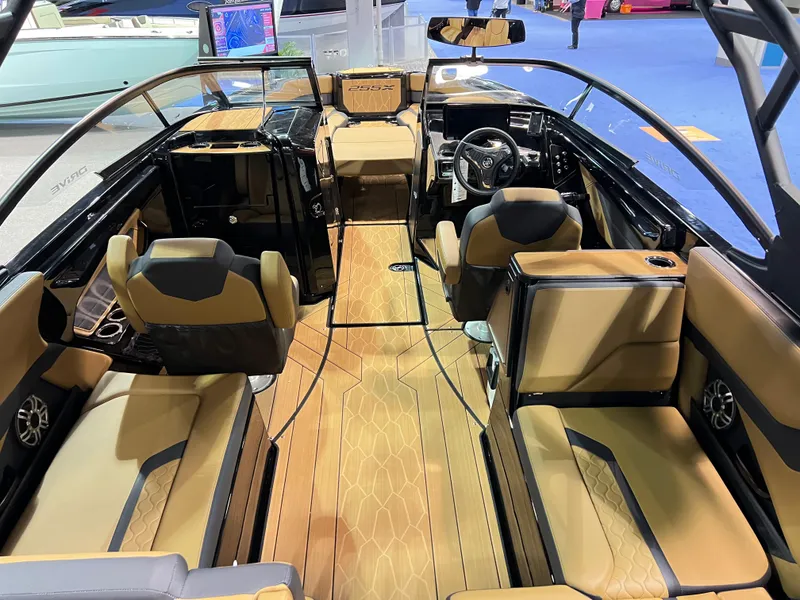 Slide: The Image of Interior of 2025 Yamaha Boats 255XD, featuring luxurious seating and modern design. - 2
