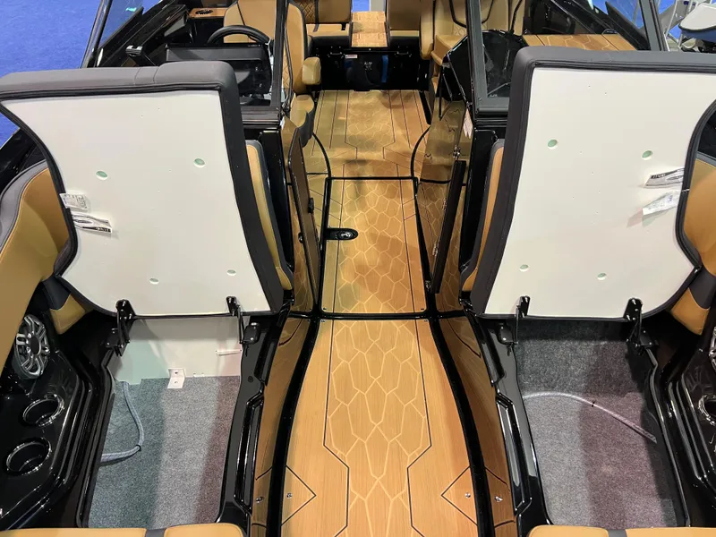Slide: The Image of Interior view of 2025 Yamaha Boats 255XD, featuring sleek design and wood-patterned flooring. - 9