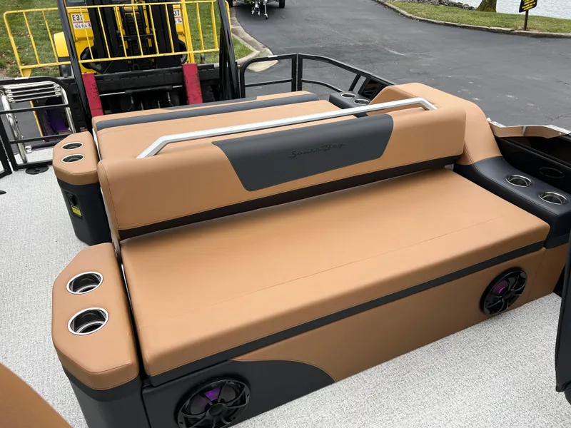 Slide: The Image of 2025 South Bay 523 ULE 3.0+ boat seating with cup holders and speakers. - 11