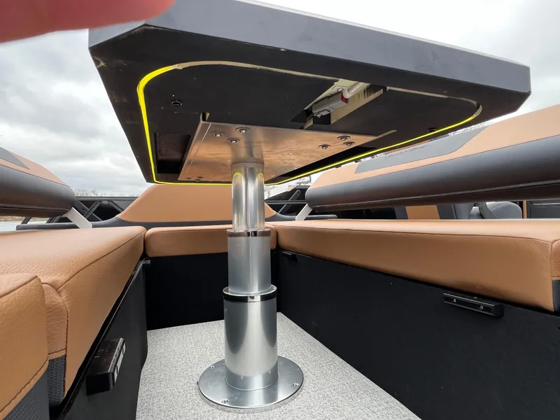 Slide: The Image of Interior of 2025 South Bay 523 ULE 3.0+ boat with modern seating and table design. - 15