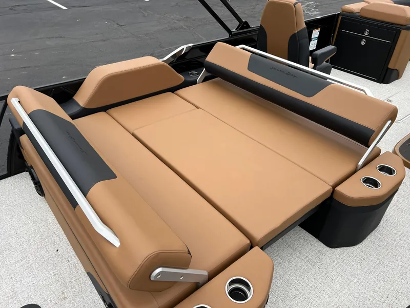 Slide: The Image of Luxurious seating on 2025 South Bay 523 ULE 3.0+ pontoon boat, tan and black upholstery. - 17