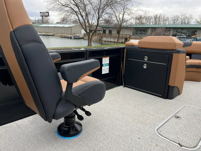 Slide: The Image of 2025 South Bay 523 ULE 3.0+ boat interior with seating and storage. - 22