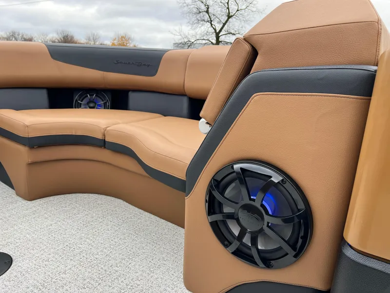 Slide: The Image of Luxurious seating on 2025 South Bay 523 ULE 3.0+ pontoon boat with built-in speakers. - 34