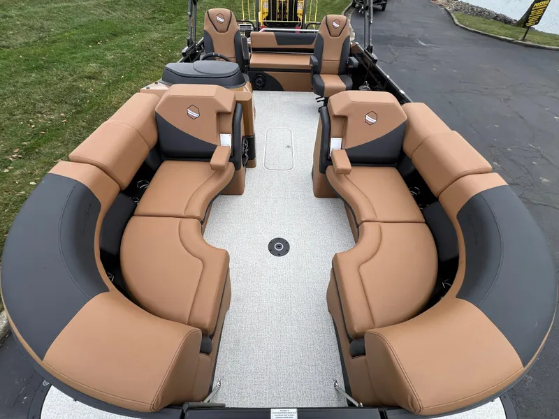 Slide: The Image of Luxurious 2025 South Bay 523 ULE 3.0+ pontoon boat with spacious tan seating. - 6