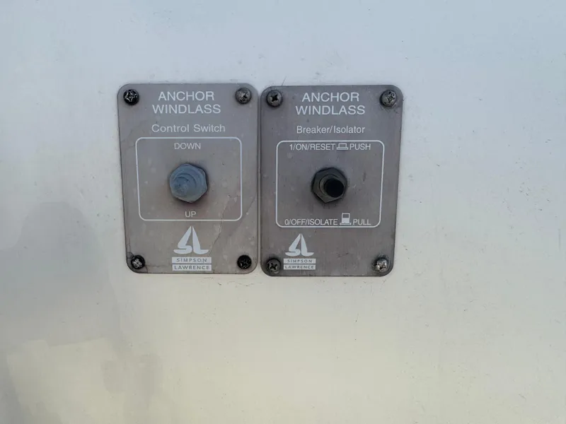 Slide: The Image of Anchor windlass control and breaker on 1998 Cobia 220 Walkaround boat. - 7