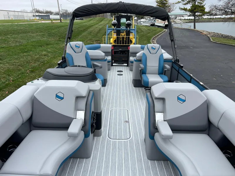 Slide: The Image of 2025 South Bay 523 RS3 3.0+ pontoon boat with spacious seating and modern design. - 12