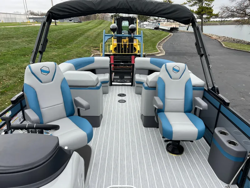 Slide: The Image of 2025 South Bay 523 RS3 3.0+ pontoon boat with spacious seating and modern design. - 13