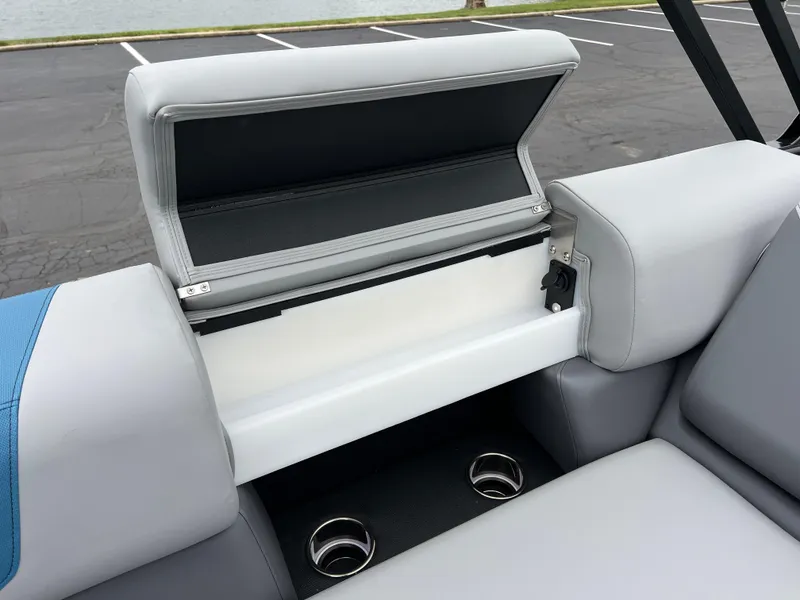 Slide: The Image of 2025 South Bay 523 RS3 3.0+ boat seat storage with cup holders. - 19