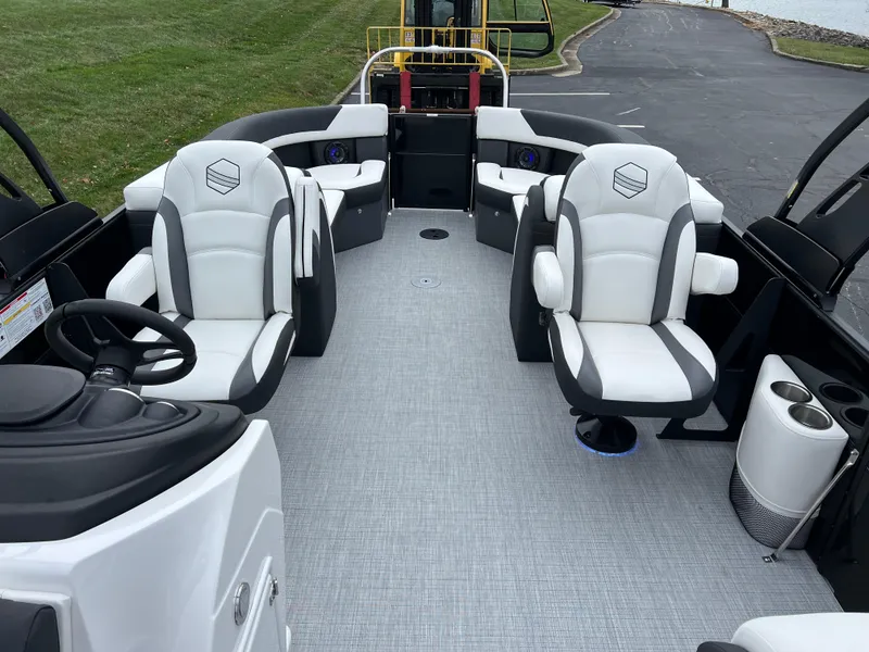 Slide: The Image of 2025 South Bay S224 RS 3.0 Hybrid Arch boat interior with plush seating and modern design. - 12