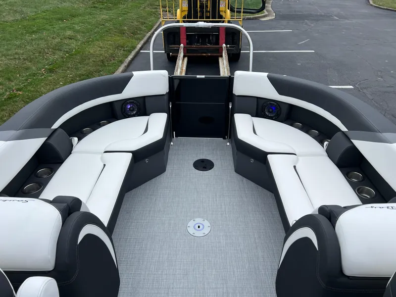 Slide: The Image of 2025 South Bay S224 RS 3.0 Hybrid Arch pontoon boat interior with sleek seating. - 13
