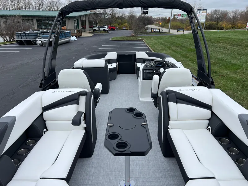 Slide: The Image of 2025 South Bay S224 RS 3.0 Hybrid Arch pontoon boat with luxurious seating and sleek design. - 17