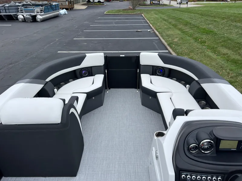 Slide: The Image of 2025 South Bay S224 RS 3.0 Hybrid Arch pontoon boat interior with plush seating. - 24