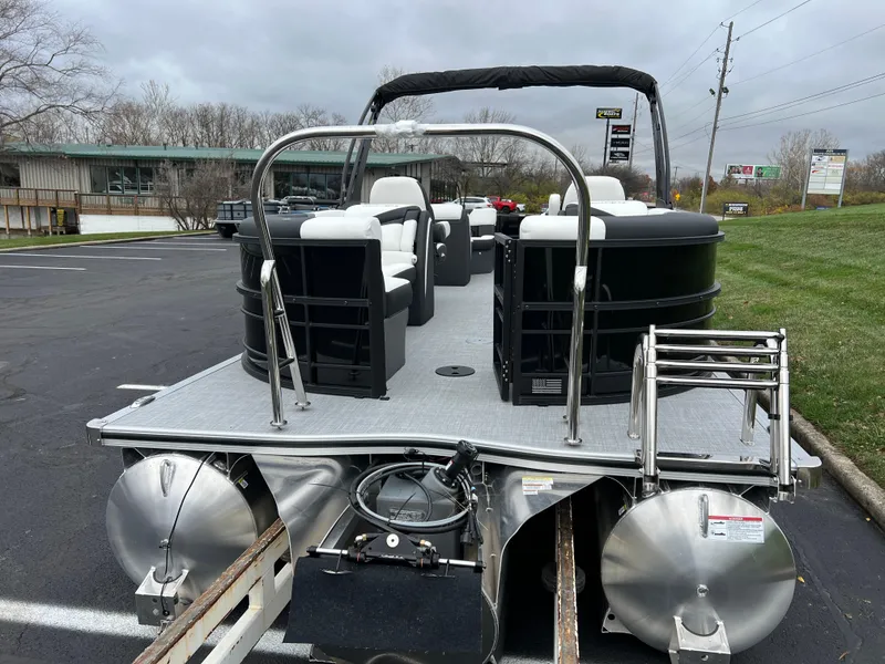 Slide: The Image of 2025 South Bay S224 RS 3.0 Hybrid Arch pontoon boat in parking lot. - 6