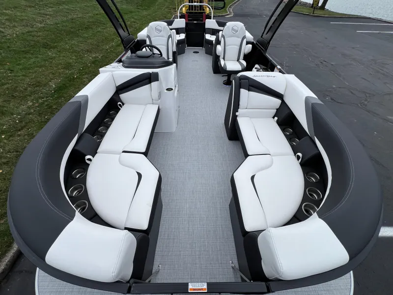 Slide: The Image of 2025 South Bay S224 RS 3.0 Hybrid Arch boat interior with luxurious seating and modern design. - 7