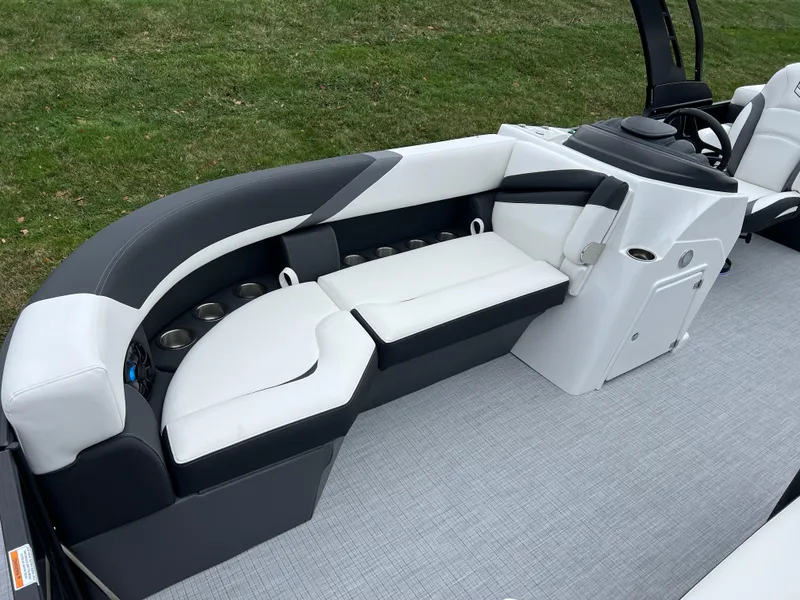 Slide: The Image of 2025 South Bay S224 RS 3.0 Hybrid Arch boat interior with sleek seating design. - 8
