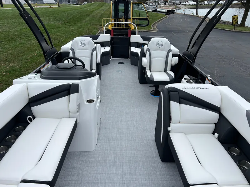 Slide: The Image of 2025 South Bay S224 RS 3.0 Hybrid Arch pontoon boat with luxurious seating and modern design. - 9