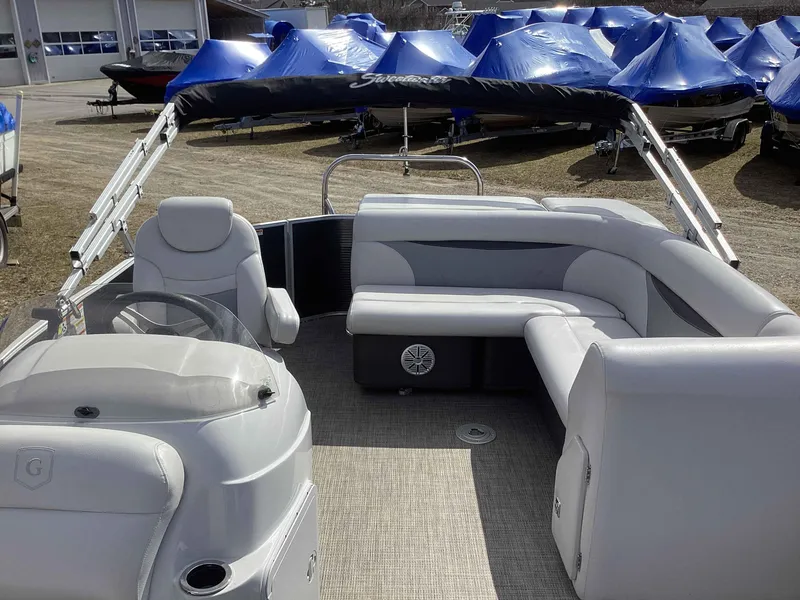 Slide: The Image of 2017 Godfrey SWEETWATER 2086 pontoon boat interior with gray seating and helm. - 3