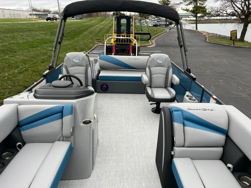 Slide: The Image of 2025 South Bay S224UL pontoon boat with spacious seating and modern design. - 10