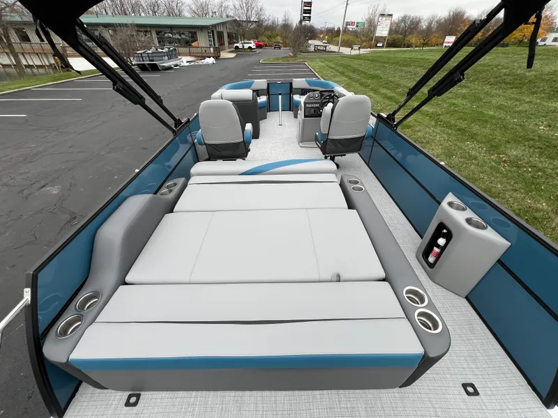 Slide: The Image of 2025 South Bay S224UL pontoon boat with spacious seating and modern design. - 18