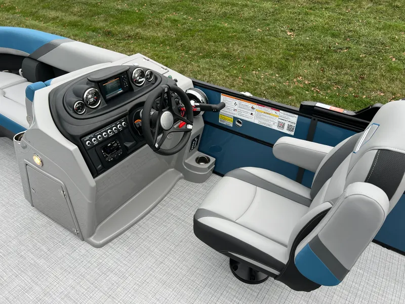 Slide: The Image of 2025 South Bay S224UL boat interior with modern helm and comfortable seating. - 19