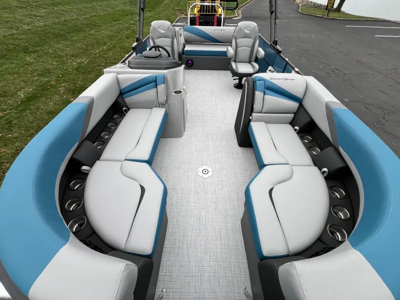 Slide: The Image of 2025 South Bay S224UL pontoon boat with spacious seating and modern design. - 7