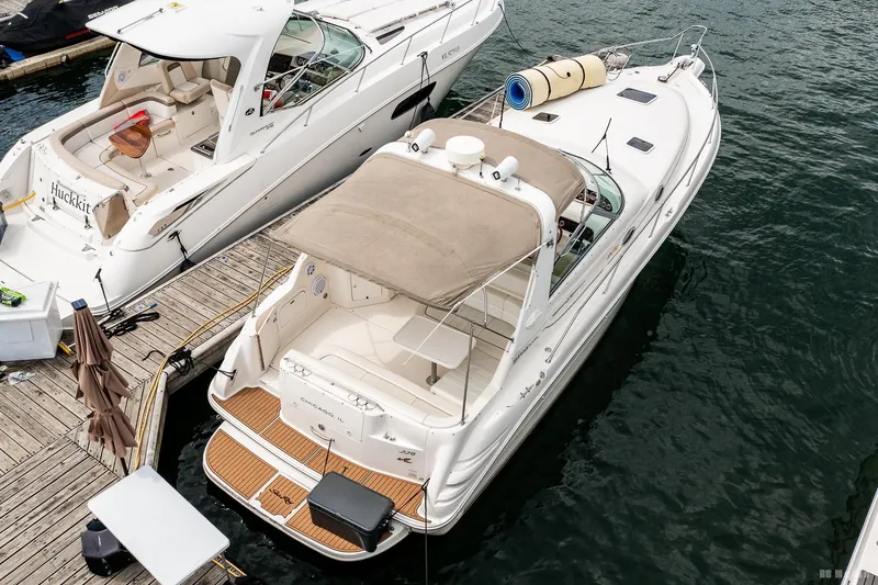 Slide: The Image of 1998 Sea Ray 330 Sundancer docked at marina, aerial view. - 12