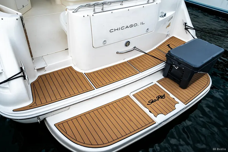 Slide: The Image of 1998 Sea Ray 330 Sundancer boat with teak deck, docked in Chicago, IL. - 15