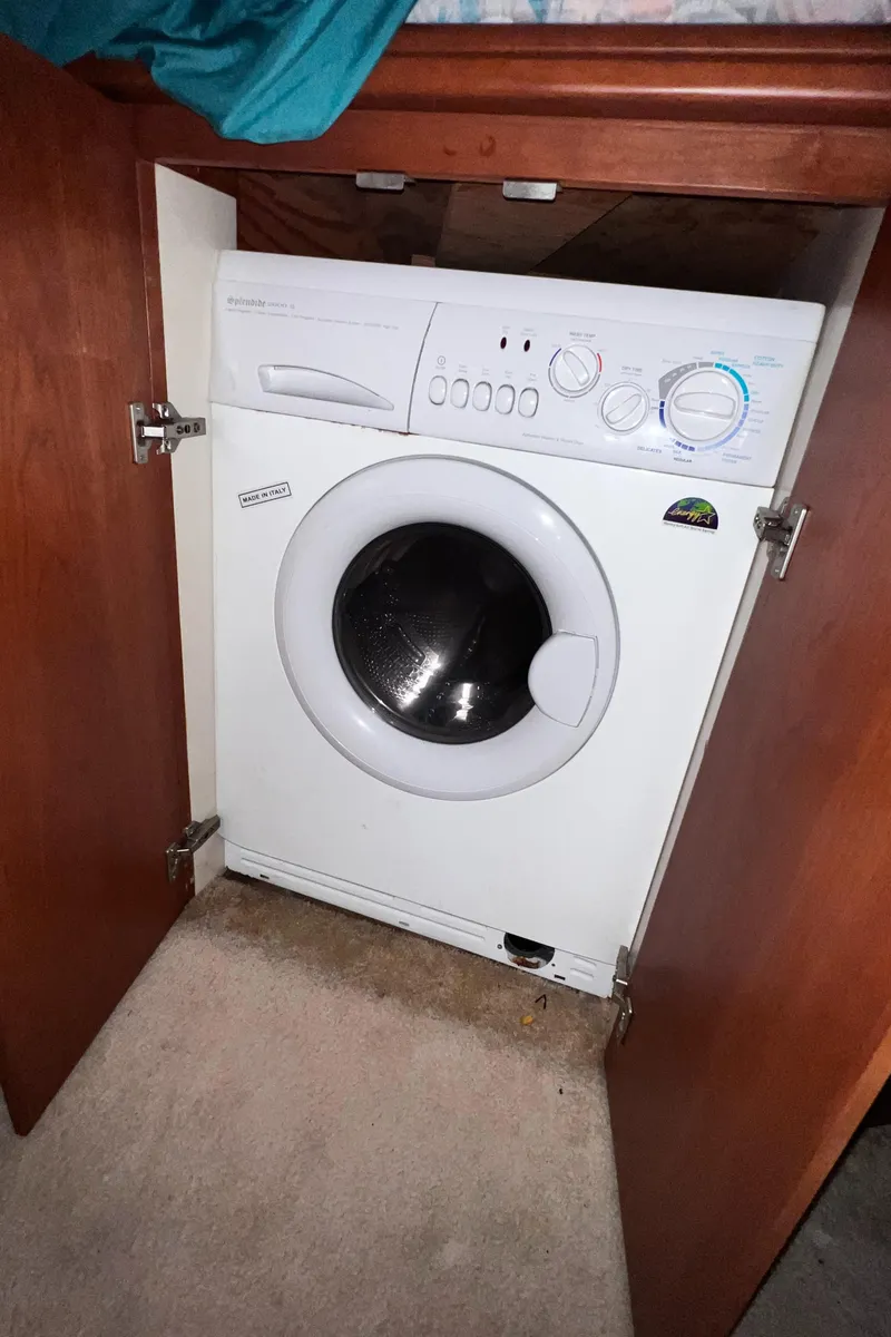 Slide: The Image of Washing machine inside a 2004 Silverton 39 Motor Yacht cabinet. - 18