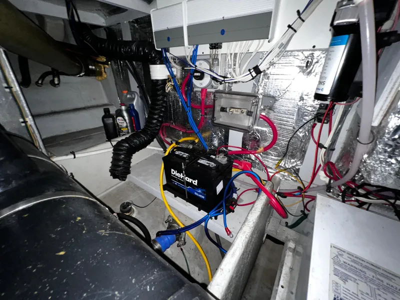 Slide: The Image of Engine room of 2004 Silverton 39 Motor Yacht with DieHard battery and wiring. - 30