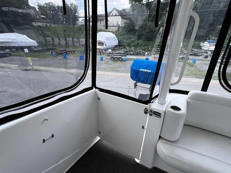 Slide: The Image of Interior view of a 2004 Silverton 39 Motor Yacht, showing seating and windows. - 6