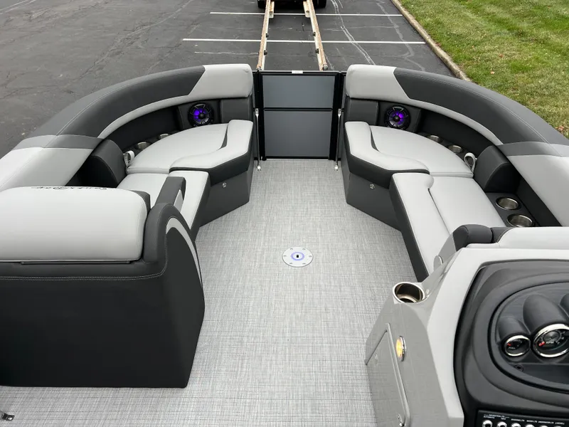 Slide: The Image of 2025 South Bay S224 Entertainer 3.0 pontoon boat interior with plush seating and modern design. - 21