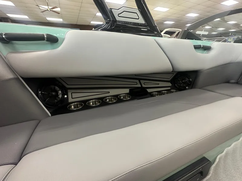 Slide: The Image of 2025 Moomba Max interior with sleek seating and integrated speakers. - 16