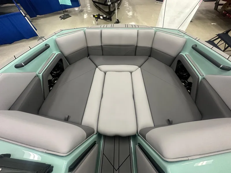 Slide: The Image of 2025 Moomba Max boat interior with spacious seating and modern design. - 28
