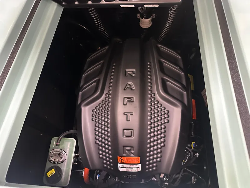 Slide: The Image of 2025 Moomba Max Raptor engine, detailed view in boat compartment. - 36