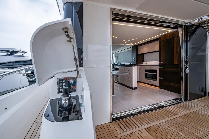 Slide: The Image of Luxurious interior of 2022 Sunseeker Manhattan 68 yacht with modern kitchen design. - 21
