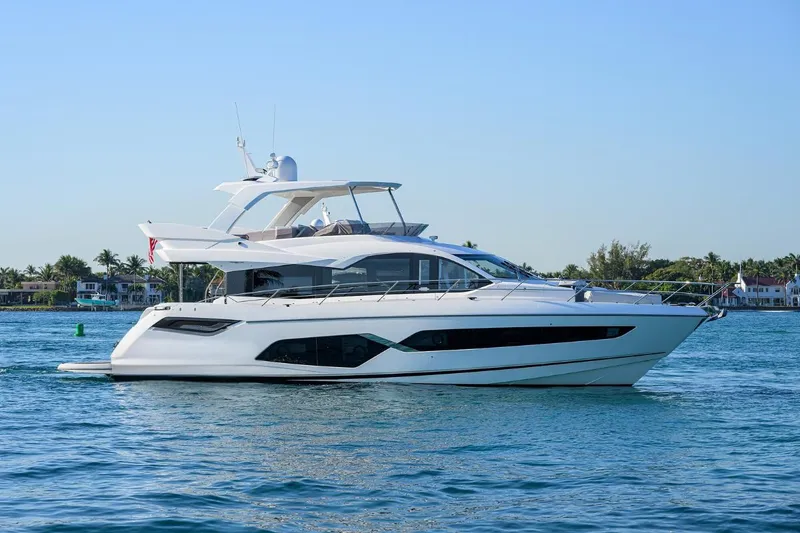 Slide: The Image of 2022 Sunseeker Manhattan 68 yacht cruising on calm waters. - 3