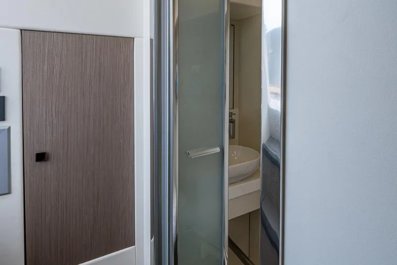 Slide: The Image of Interior view of 2022 Sunseeker Manhattan 68 yacht bathroom with modern design. - 31
