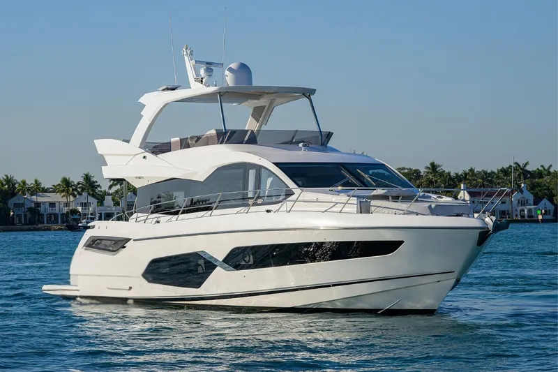 Slide: The Image of 2022 Sunseeker Manhattan 68 yacht cruising on a sunny day. - 4