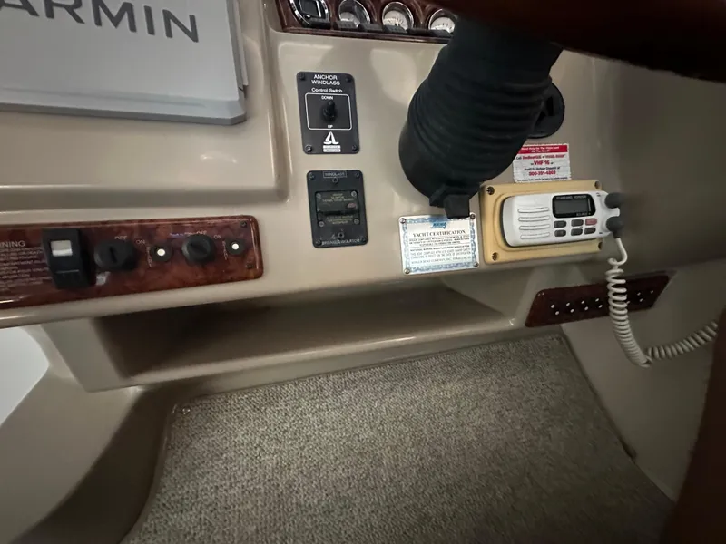 Slide: The Image of Control panel of a 2003 Rinker Fiesta Vee 312 boat with Garmin equipment. - 8