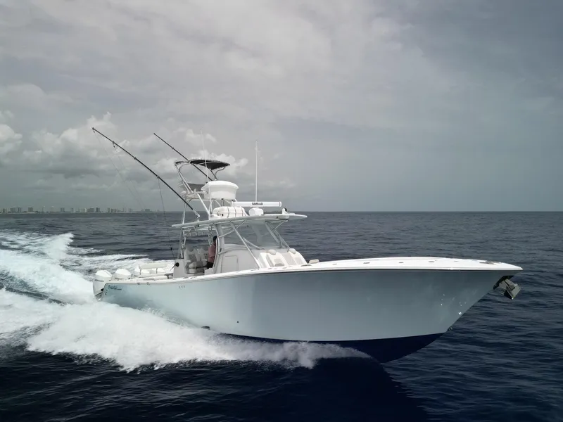 The Image of 2021 Front Runner 39 Center Console boat cruising on open ocean. - 1